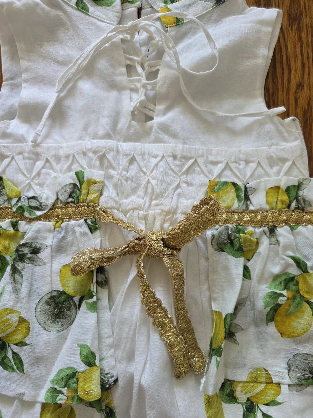 White Lemon-Print Baby Dress Romper with Gold Accent